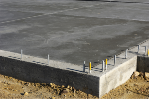 Reinforced structural concrete footings and foundation pour with rebar